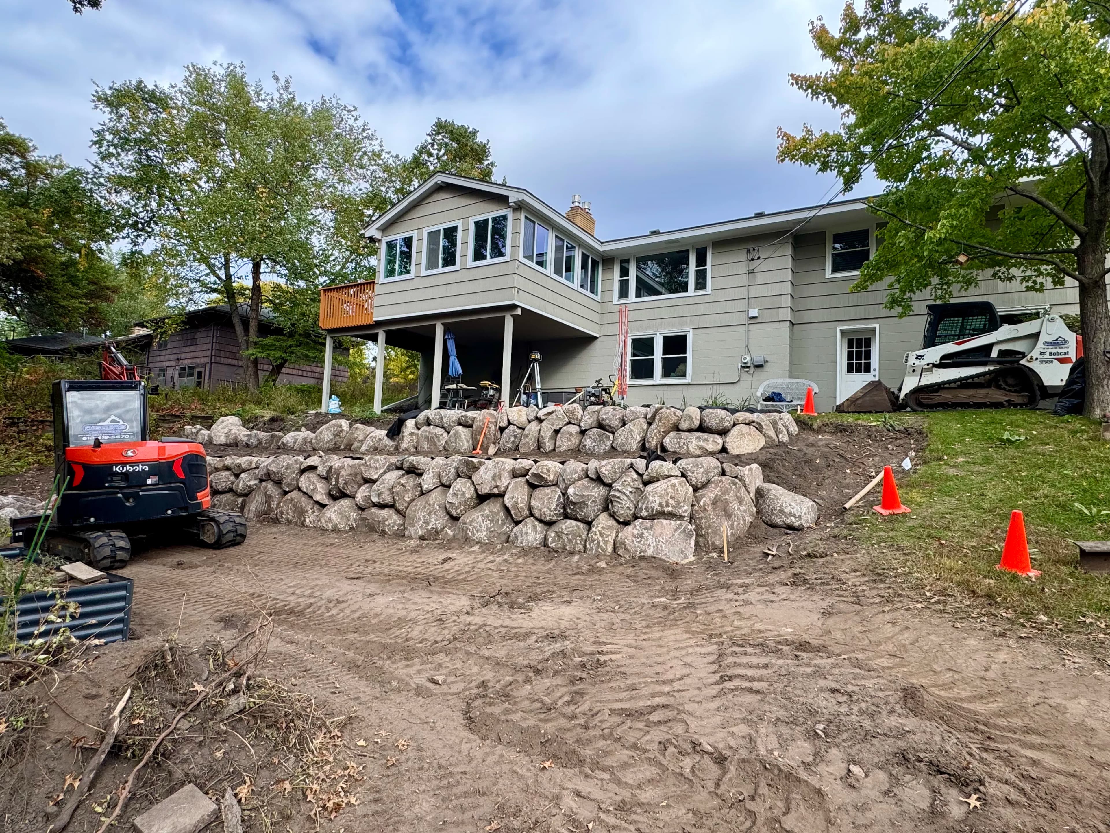Project Dual Boulder Retaining Walls Taking Shape in Hopkins image