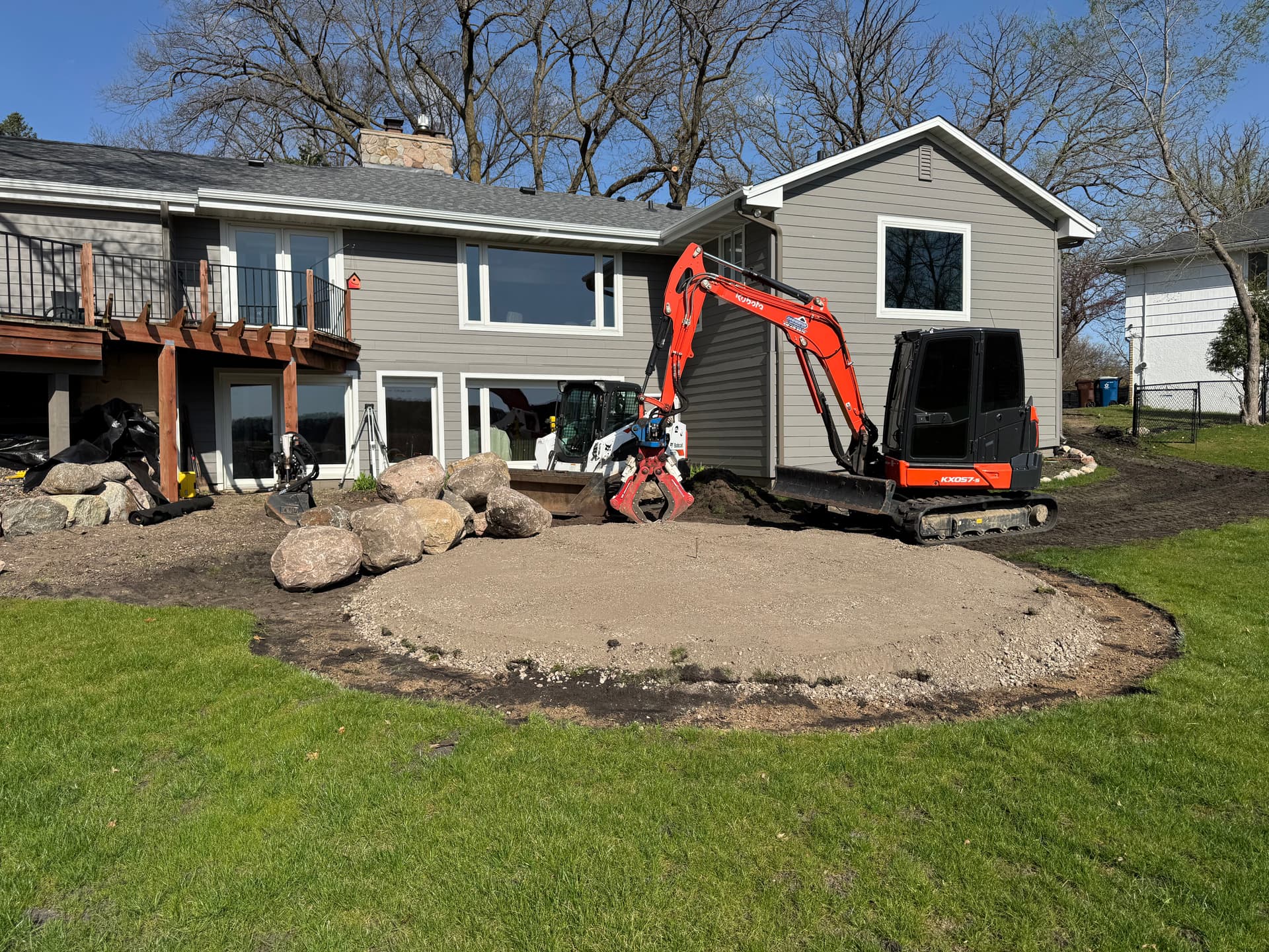 Gallery photos for paver patio and boulder wall prep underway in wayzata: Image #1