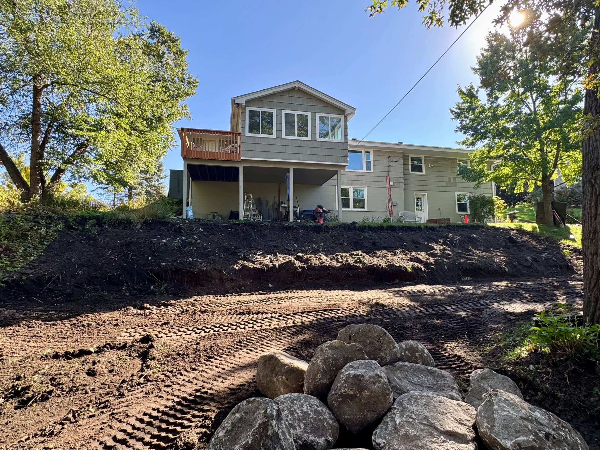 Terraced Boulder Retaining Walls and Steps Underway in Hopkins