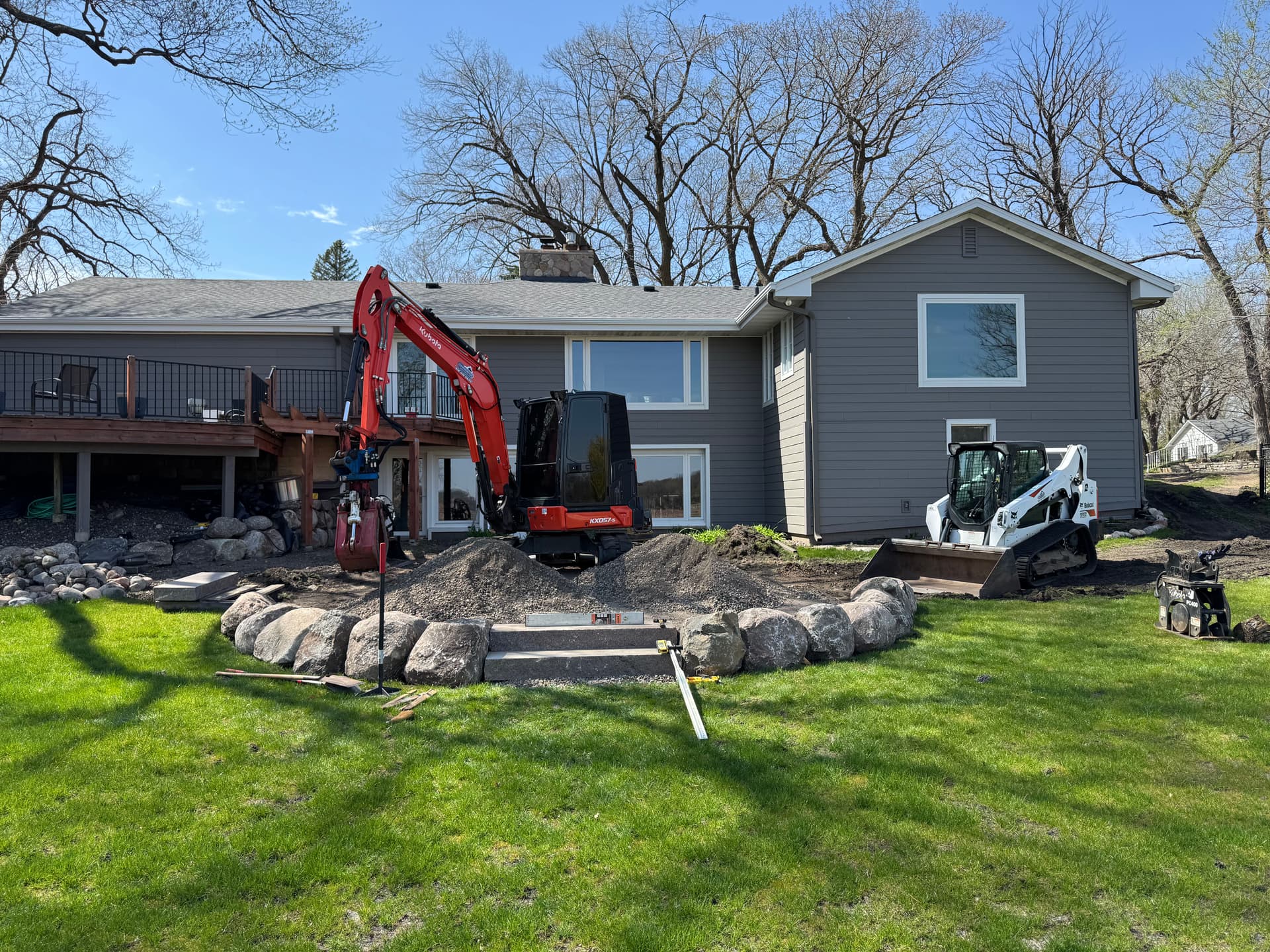 Gallery photos for paver patio and boulder wall prep underway in wayzata: Image #2
