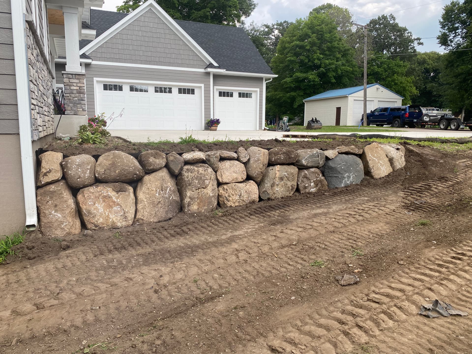 Boulder Retaining Walls Built Right on New Construction image